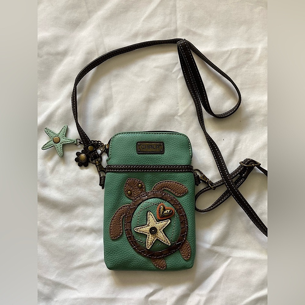 NWOT Chala crossbody bag. Leather with turtle design. Excellent condition.